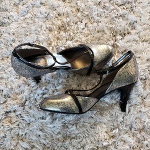 Silver and black high heels.
